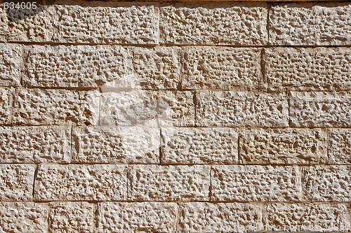 Image of Rough beige stone wall blocks texture