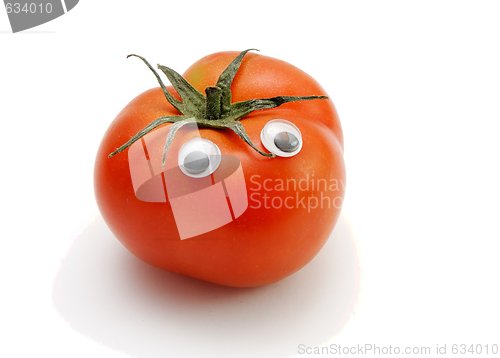 Image of Funny red tomato with eyes isolated
