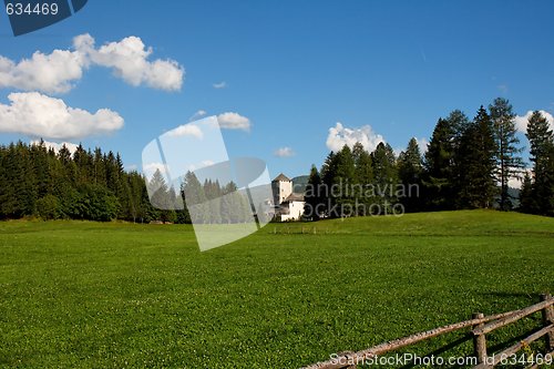 Image of Medieval Mauterndorf castle among lush green meadows in Austria