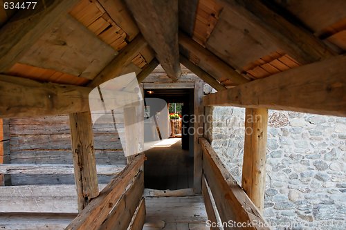 Image of Wooden gallery in ancient peasant house 