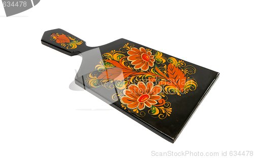 Image of Russian black cutting board painted with flowers isolated