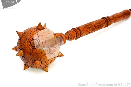 Image of Wooden spiky souvenir mace isolated 