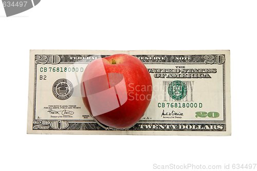 Image of Red nectarine peach on twenty dollar bill isolated