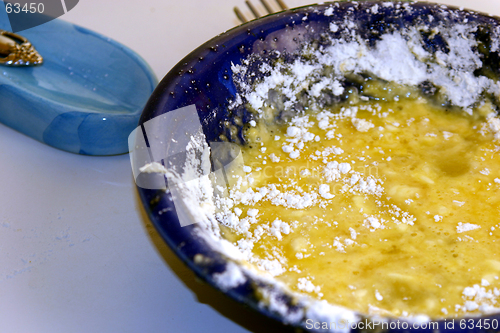 Image of Flour and Egg on a blue bowL