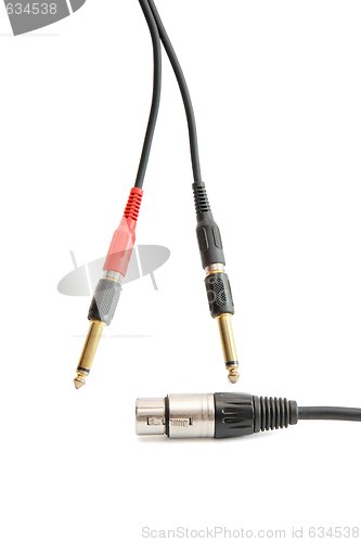 Image of Red, black, silver and golden headphone plugs isolated 