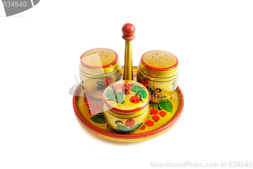 Image of Russian wooden painted saltcellar, pepperbox and sugar basin isolated