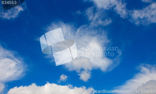 Image of White cumulus cloudscape in blue sky