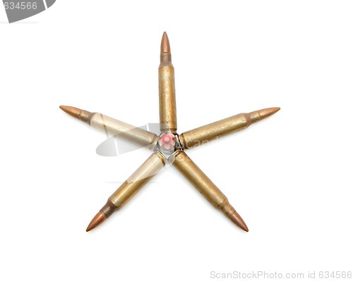 Image of Five-pointed star made of 5.56mm M16 assault rifle cartridges isolated