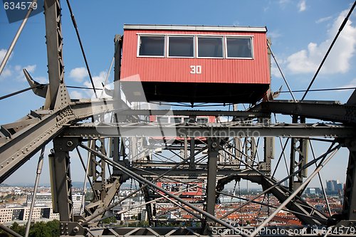 Image of Gondola of large ferris observation wheel in amusement park