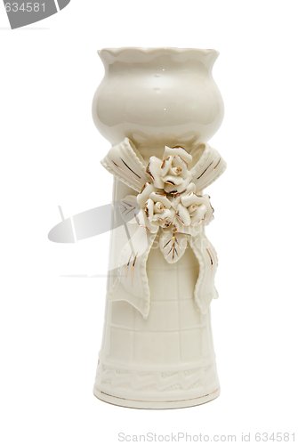 Image of White porcelain vase with bow and golden furnish  isolated