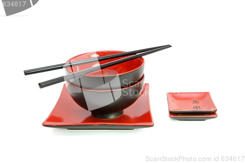 Image of Red and black oriental table set isolated