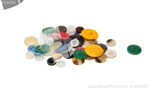 Image of Heap of assorted old sewing buttons isolated