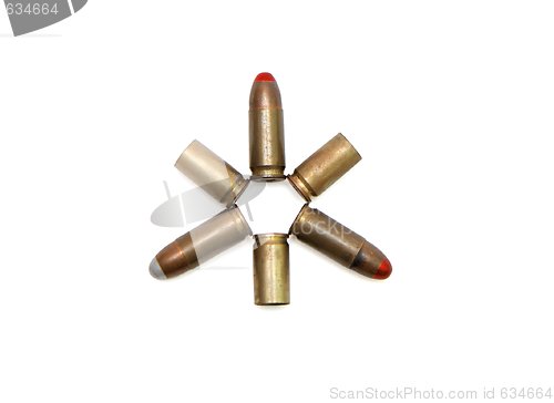 Image of Star made of 9mm Parabellum cartridges and spent cases isolated