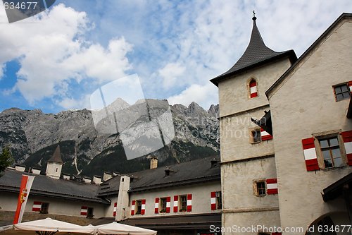 Image of Towers of Hohenwerfen medieval castle on Alpine background