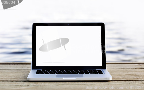 Image of Laptop on a footbridge