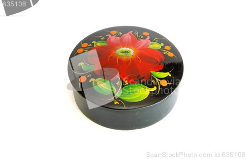 Image of Oval black casket with flower pattern isolated