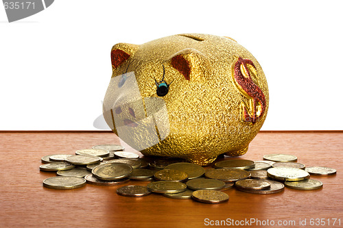 Image of Money-box on the table with white background