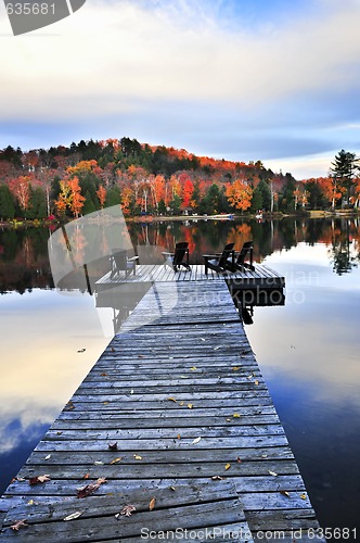 Image of Wooden dock on autumn lake