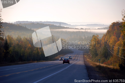 Image of An autumn's landscape with fog