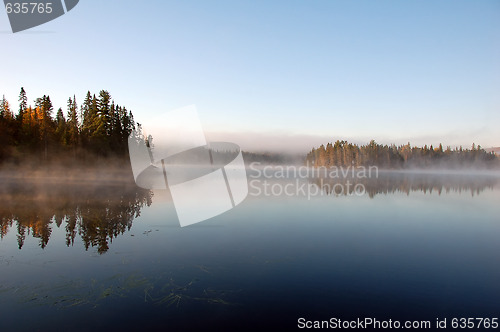 Image of An autumn's landscape with fog