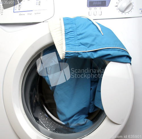 Image of Trousers and laundry.