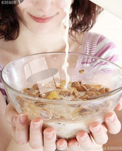 Image of Young people eating milk with cereals