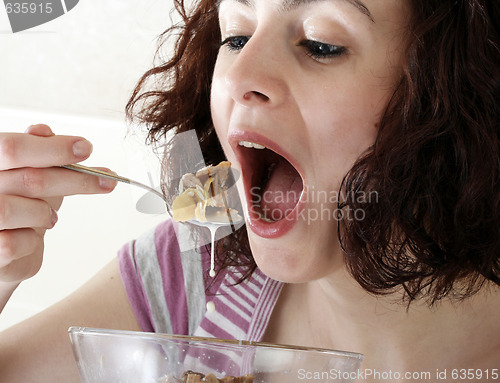 Image of Young people eating milk with cereals