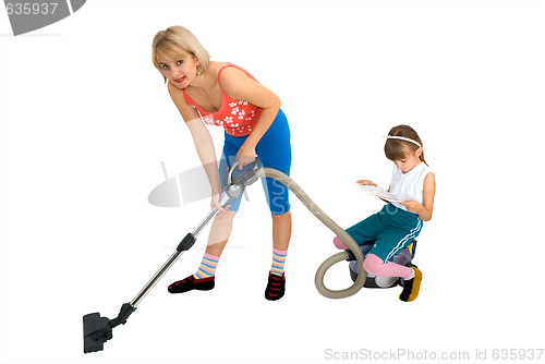 Image of Mum, daughter and a vacuum cleaner