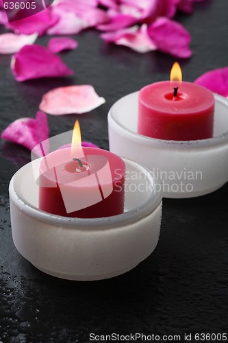 Image of Candle and flower petal decoration.