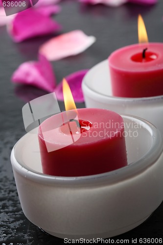 Image of Candle and flower petal decoration.