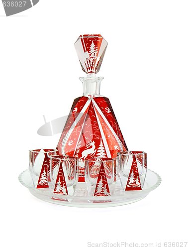 Image of Red crystal carafe and liqueur-glasses on round plate isolated