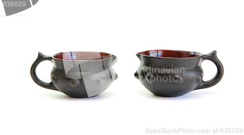 Image of Two black decorative ceramic pots isolated