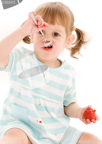 Image of little girl with strawberry