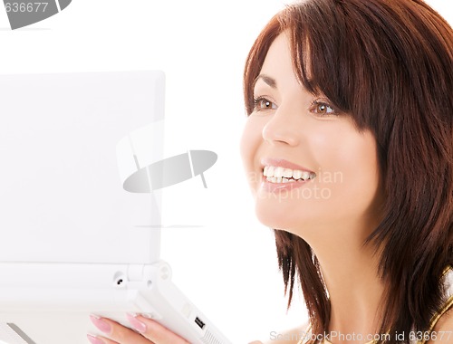 Image of happy woman with laptop computer