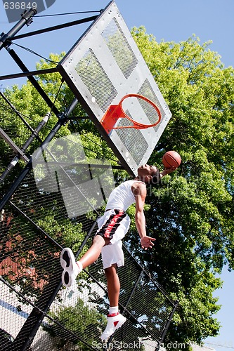 Image of Jumping basketball player
