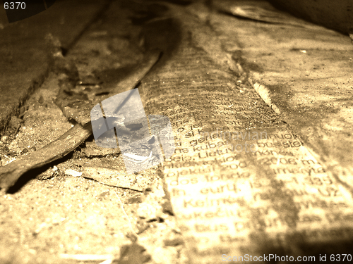 Image of Grungy and burned newspaper