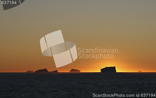 Image of Icebergs at sunset