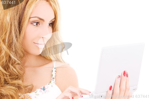 Image of happy woman with laptop computer