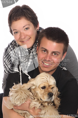 Image of Girl, guy and american cocker spaniel 