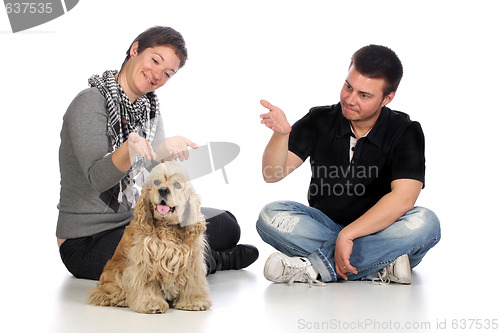 Image of Girl, guy and american cocker spaniel 