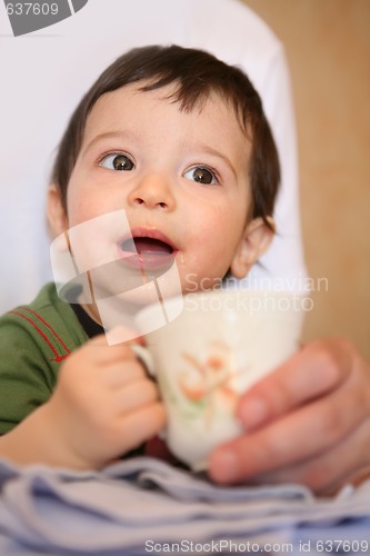 Image of baby with cup