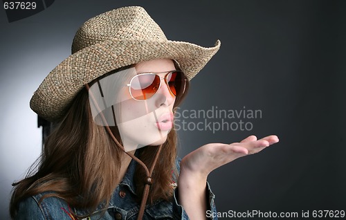 Image of pretty girl in cowboy hat