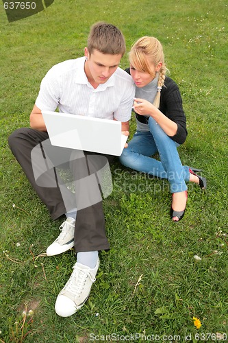 Image of students with laptop