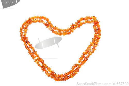 Image of Amber beads double frame in shape of heart isolated 