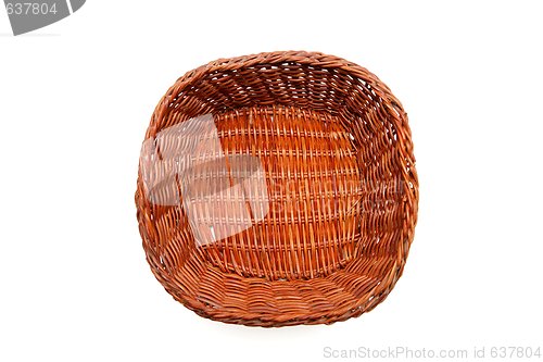 Image of Brown wicker basket top view isolated