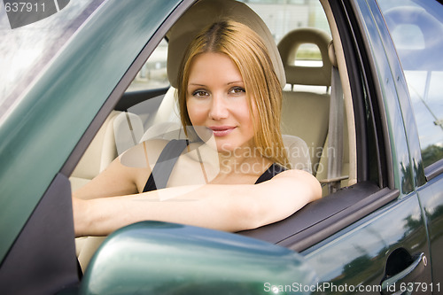 Image of pretty girl in the car