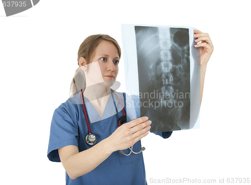 Image of Young nurse studying x-ray