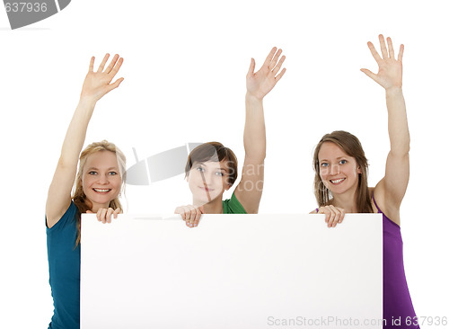 Image of Three young women holding a banner and greeting