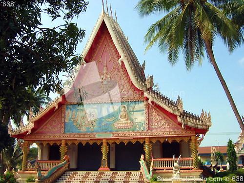 Image of Palm trees and temples. Vientiane. Laos