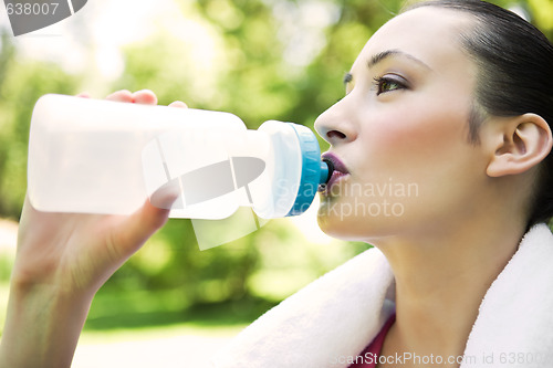 Image of Caucasian woman drinking water